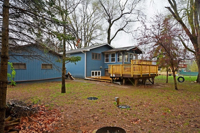 rear view of house with a deck