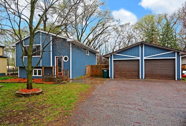 view of front of house with central AC, a front lawn, and fence