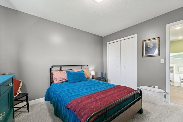 23892 187th St NW, Big Lake, MN 55309 - carpeted bedroom featuring a closet and baseboards