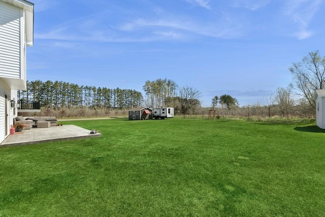 23892 187th St NW, Big Lake, MN 55309 - view of grassy yard featuring a patio