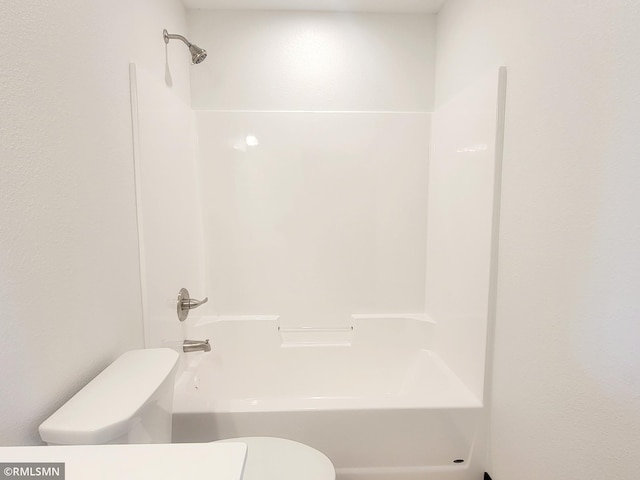 full bathroom featuring toilet and tub / shower combination