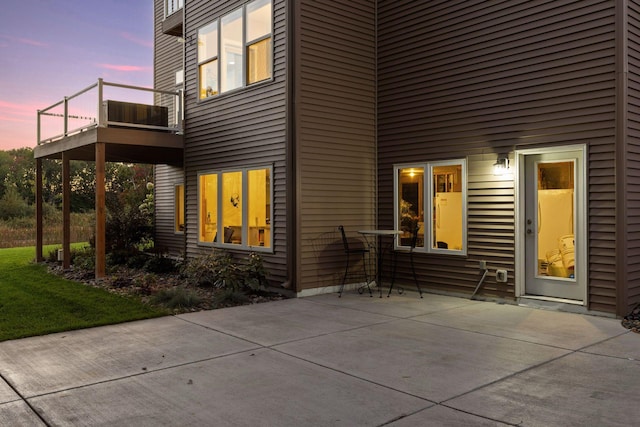 exterior space featuring a patio area and a balcony