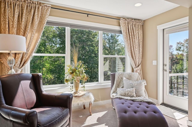 sitting room with recessed lighting, baseboards, and carpet
