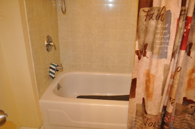 full bath featuring shower / bath combo with shower curtain