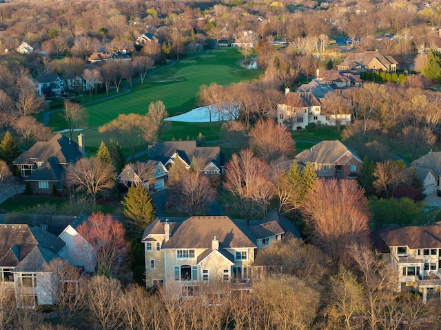 aerial view with view of golf course and a residential view