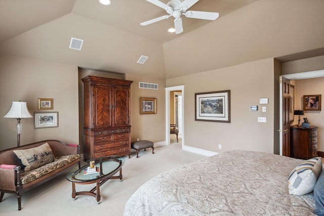 bedroom featuring visible vents, vaulted ceiling, and light carpet