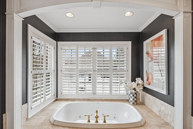 bathroom featuring crown molding, a whirlpool tub, and recessed lighting