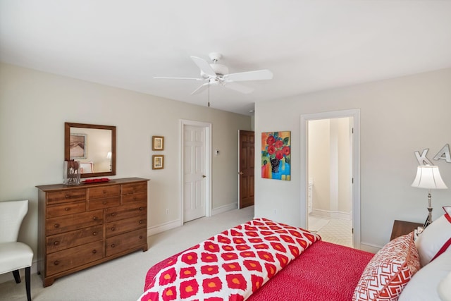 carpeted bedroom with baseboards and a ceiling fan