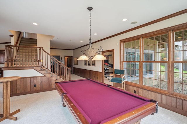 recreation room featuring a healthy amount of sunlight, billiards, and wood walls