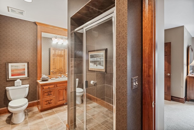 full bath featuring vanity, toilet, tile patterned floors, a shower stall, and visible vents