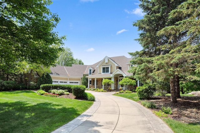 18371 Bearpath Trl, Eden Prairie, MN 55347 - shingle-style home featuring a garage, a front yard, and driveway