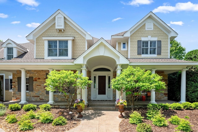 18371 Bearpath Trl, Eden Prairie, MN 55347 - craftsman inspired home featuring covered porch and a shingled roof