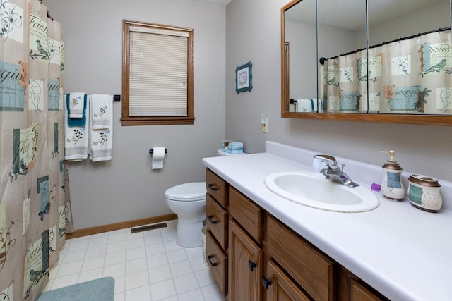 bathroom featuring toilet, vanity, baseboards, and a shower with shower curtain