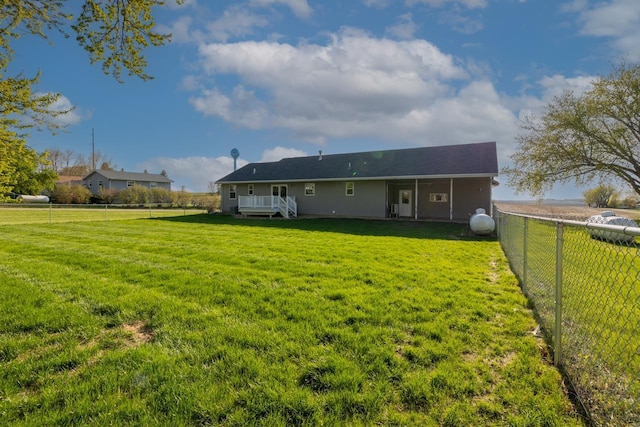 rear view of house featuring a deck
