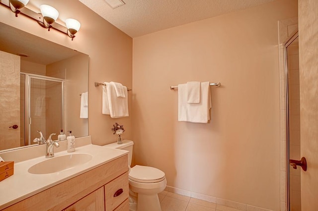 650 Main St N Unit 308, Stillwater, MN 55082 - full bathroom featuring tile patterned floors, a shower stall, vanity, toilet, and a textured ceiling