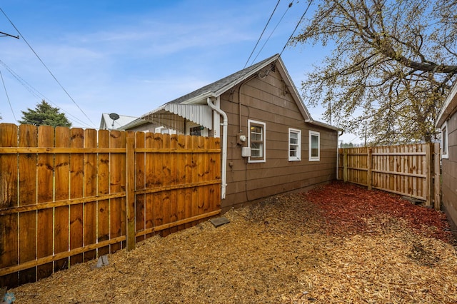 view of home's exterior with a fenced backyard