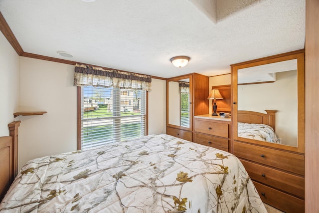 18096 Browns Lake Rd Unit 2, Eden Lake Twp, MN 56368 - bedroom with crown molding and a textured ceiling