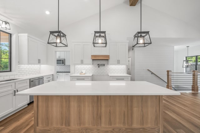 2475 179th Ave NE, Ham Lake, MN 55304 - kitchen with stainless steel appliances, high vaulted ceiling, white cabinetry, and dark wood-type flooring