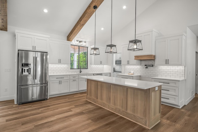 2475 179th Ave NE, Ham Lake, MN 55304 - kitchen featuring backsplash, appliances with stainless steel finishes, a sink, light countertops, and white cabinets