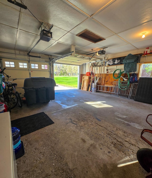 garage featuring a garage door opener