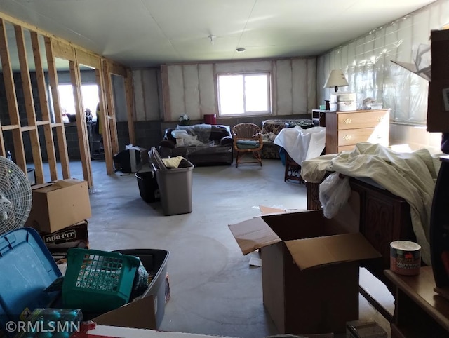 misc room with concrete floors