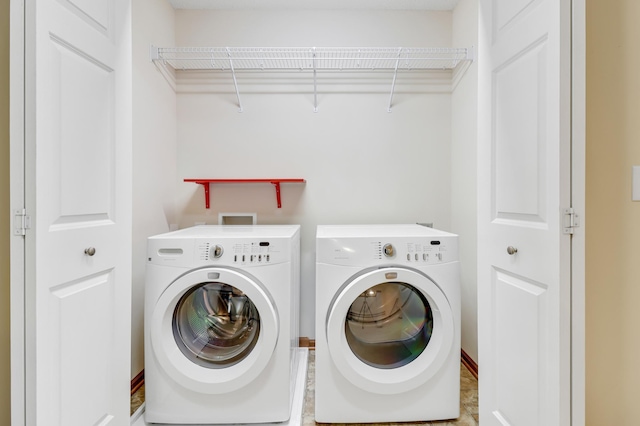 laundry room featuring laundry area and washer and dryer