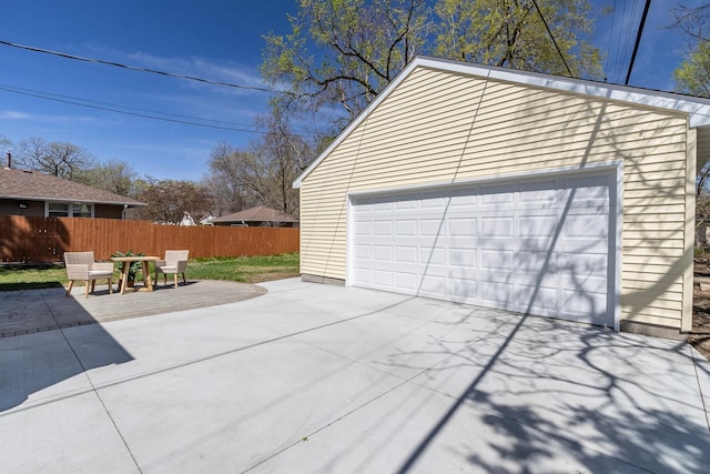 detached garage with fence