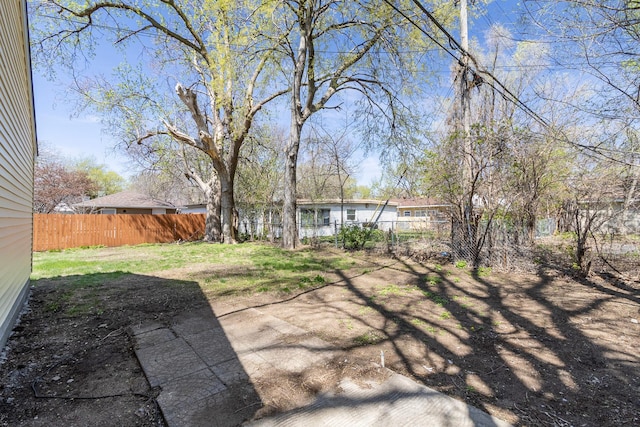 view of yard with fence