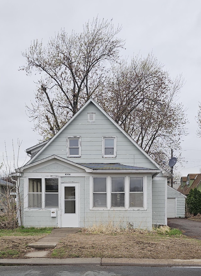 bungalow featuring a garage