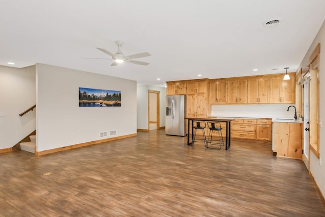 12891 Xylite St NE, Blaine, MN 55449 - unfurnished living room with recessed lighting, dark wood-style floors, and a sink