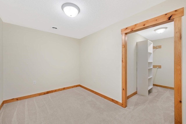 12891 Xylite St NE, Blaine, MN 55449 - spare room with baseboards and carpet