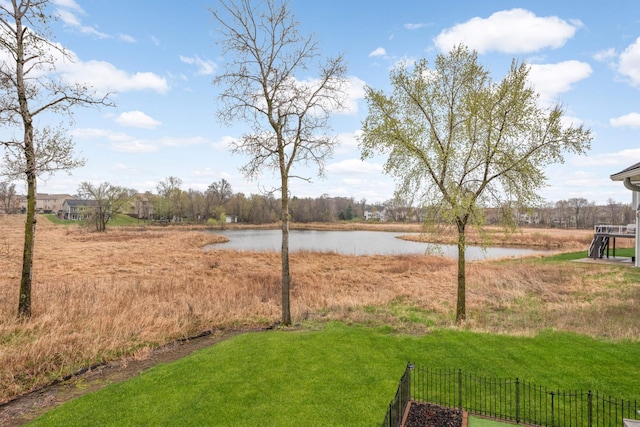 12891 Xylite St NE, Blaine, MN 55449 - view of yard featuring a water view and fence