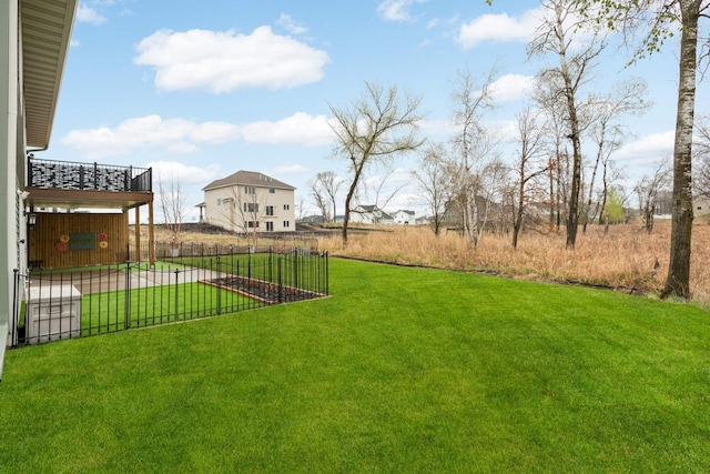 12891 Xylite St NE, Blaine, MN 55449 - view of yard with fence and a balcony