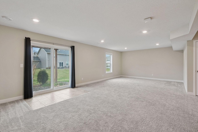 5743 Meridian Way NE, Prior Lake, MN 55372 - unfurnished room featuring carpet floors, baseboards, and recessed lighting