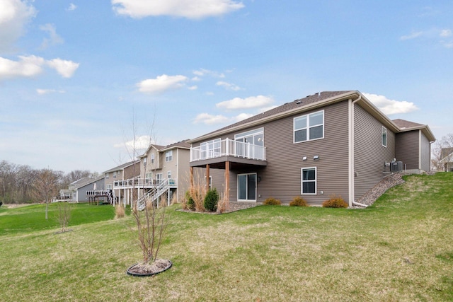 5743 Meridian Way NE, Prior Lake, MN 55372 - rear view of property with a yard and cooling unit
