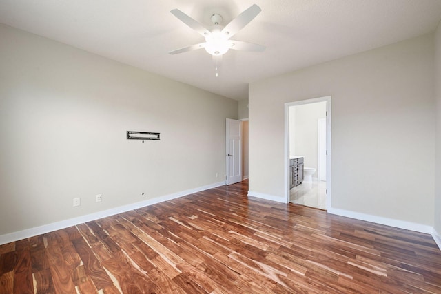 5743 Meridian Way NE, Prior Lake, MN 55372 - unfurnished room featuring wood finished floors, a ceiling fan, and baseboards