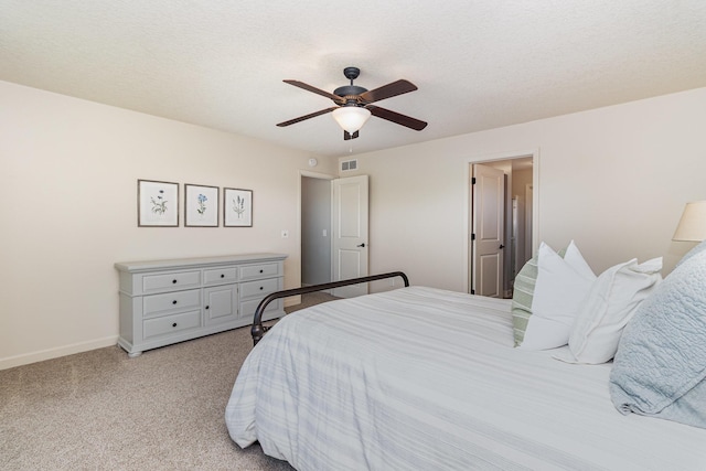 bedroom featuring light carpet, ceiling fan, and baseboards