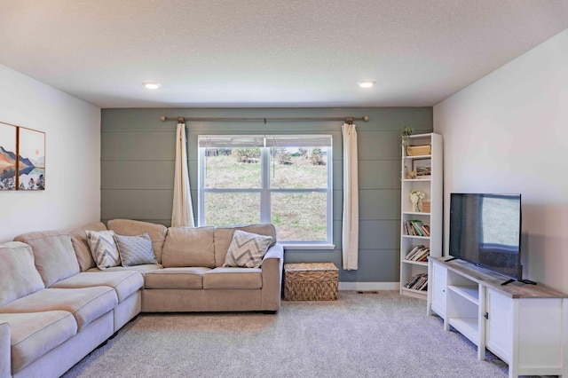 living room featuring recessed lighting and carpet