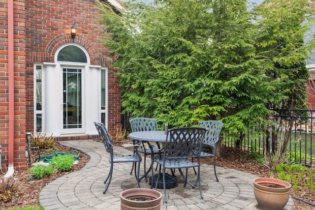 26 Mississippi River Blvd N, Saint Paul, MN 55104 - view of patio / terrace featuring fence and outdoor dining area