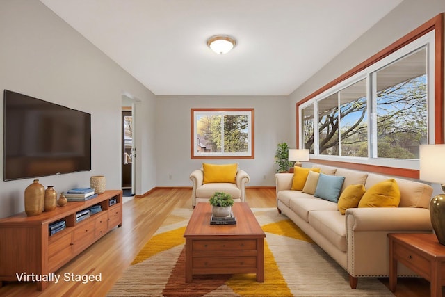 1034 Birch St, Lino Lakes, MN 55014 - living room featuring baseboards and light wood finished floors