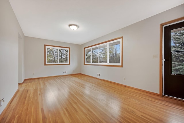 1034 Birch St, Lino Lakes, MN 55014 - empty room featuring baseboards, visible vents, and light wood-style floors