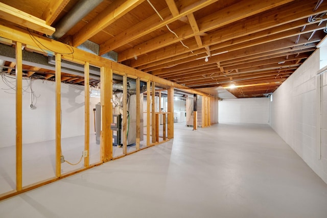 1034 Birch St, Lino Lakes, MN 55014 - unfinished basement with concrete block wall, heating unit, and washer / dryer