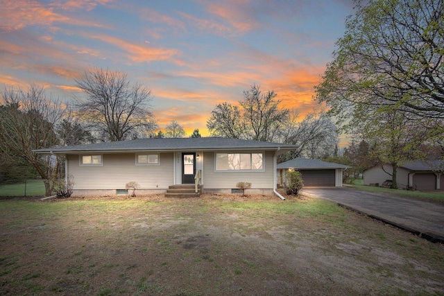 1034 Birch St, Lino Lakes, MN 55014 - view of front of house with a detached garage, an outdoor structure, and a yard