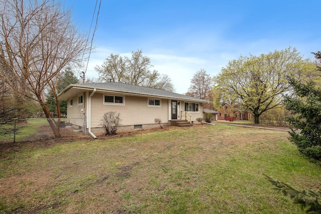 1034 Birch St, Lino Lakes, MN 55014 - rear view of house with a lawn, fence, and entry steps