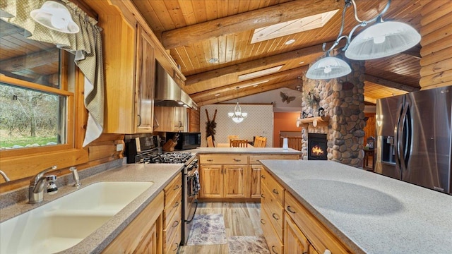 18100 Stockhousen Rd NW, Evansville, MN 56326 - kitchen with appliances with stainless steel finishes, a sink, light wood finished floors, extractor fan, and wooden ceiling