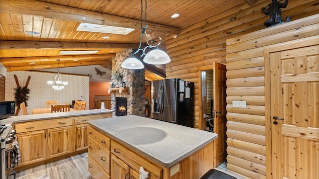 18100 Stockhousen Rd NW, Evansville, MN 56326 - kitchen featuring a fireplace, wood ceiling, a chandelier, light wood-style flooring, and appliances with stainless steel finishes