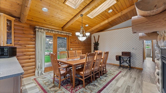 18100 Stockhousen Rd NW, Evansville, MN 56326 - dining space featuring wood ceiling, lofted ceiling with skylight, a wealth of natural light, and light wood-style flooring
