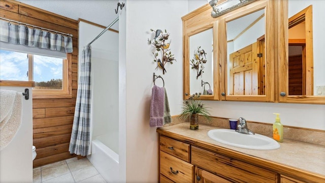 18100 Stockhousen Rd NW, Evansville, MN 56326 - full bathroom with vanity, shower / bathtub combination with curtain, tile patterned floors, and toilet