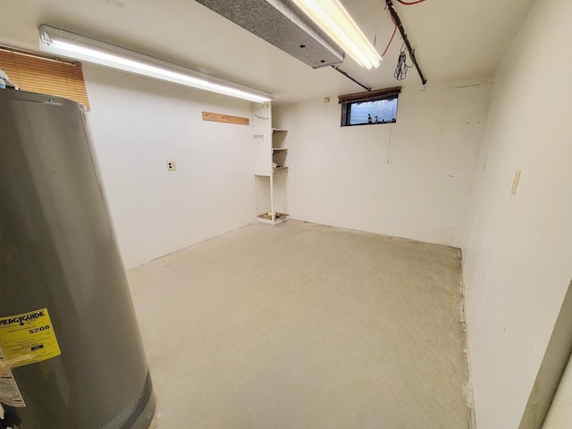 below grade area featuring electric water heater
