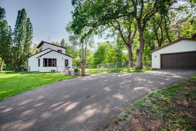 5371 Hugo Rd, White Bear Twp, MN 55110 - view of property exterior featuring a garage and an outbuilding
